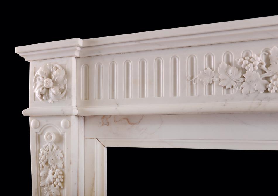 A Statuary marble fireplace in the Louis XVI style