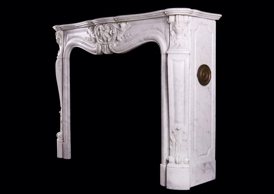 A French marble fireplace in Carrara marble