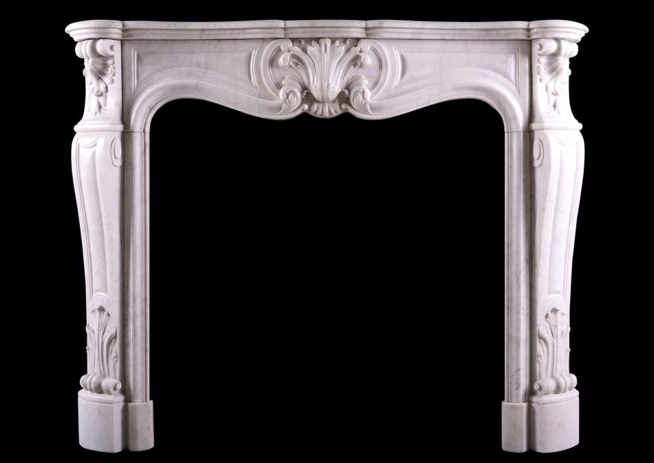 A French Carrara marble fireplace in the Louis XV style