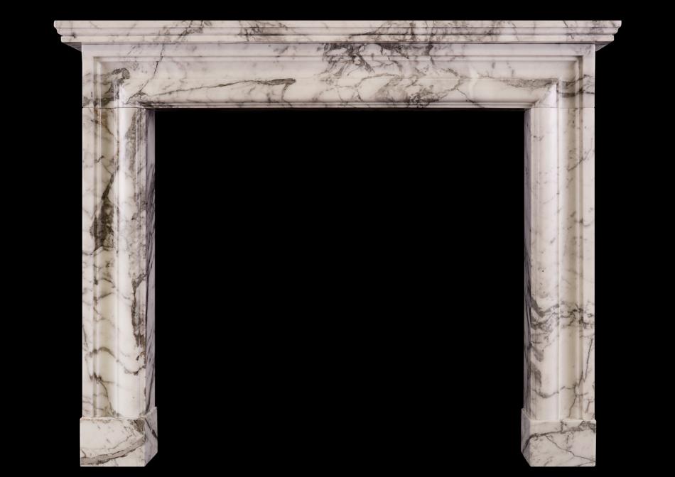 An English moulded fireplace in Arabescato marble