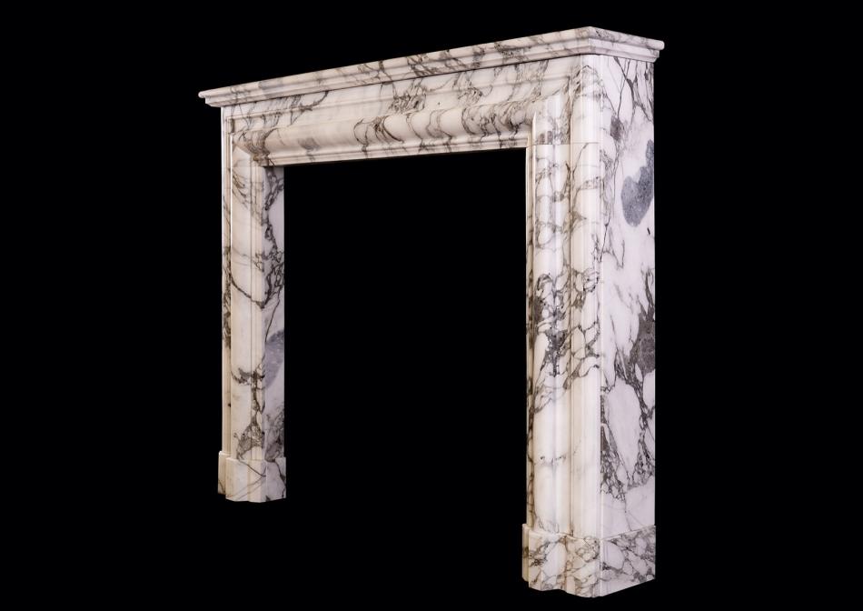 An Architectural fireplace in Arabescato marble