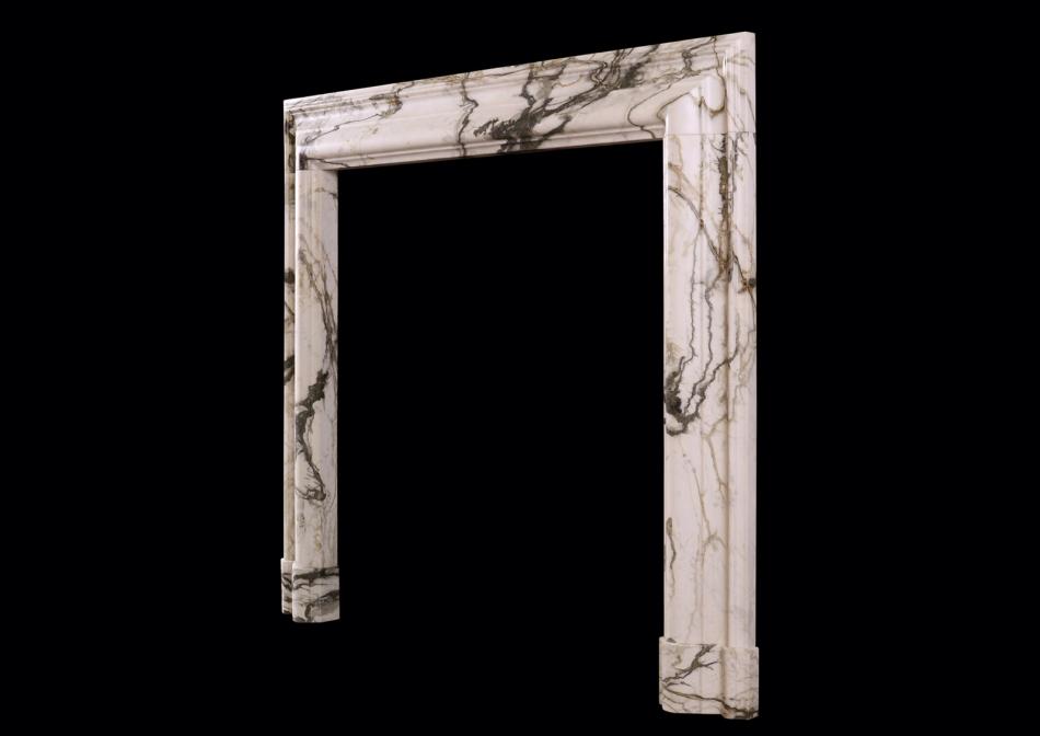 An English bolection in Calacatta Verde marble