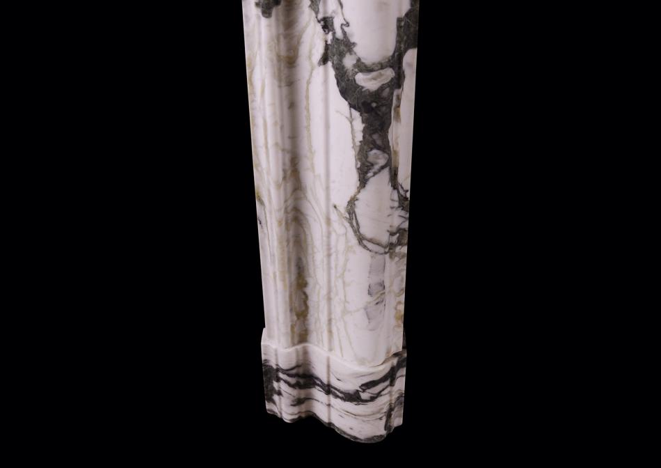 An English bolection in Calacatta Verde marble