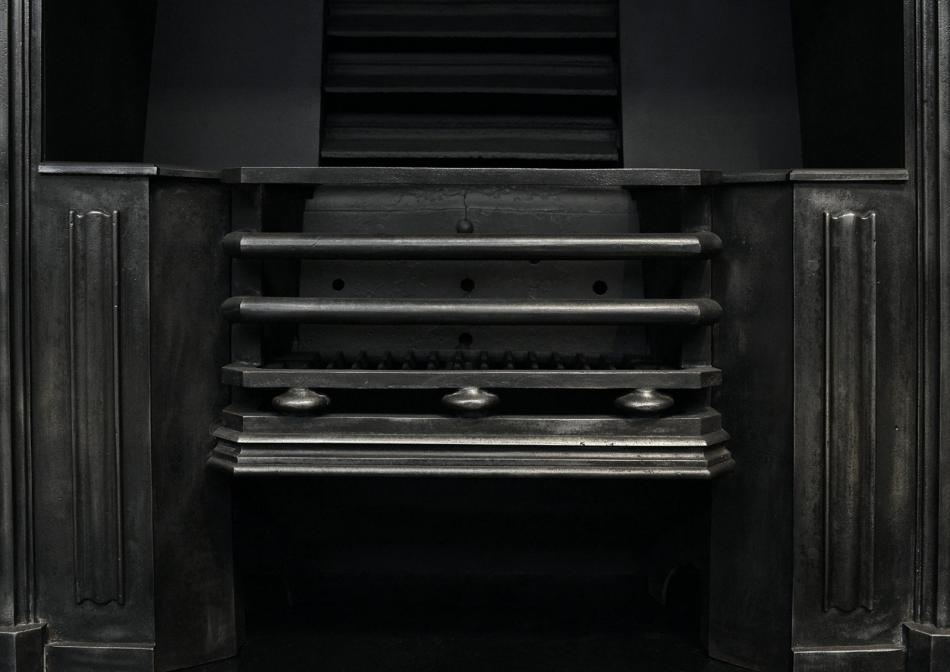 A burnished cast iron register grate