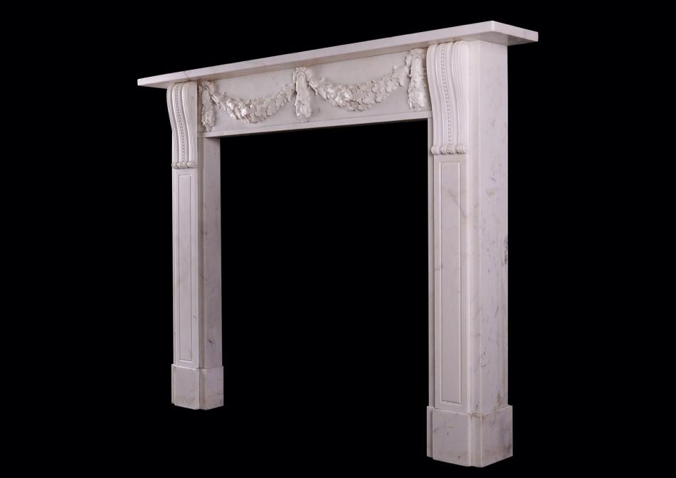 A late Regency Statuary white marble fireplace