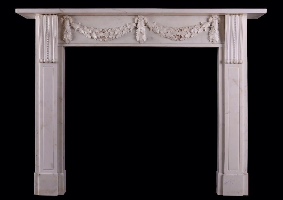A late Regency Statuary white marble fireplace