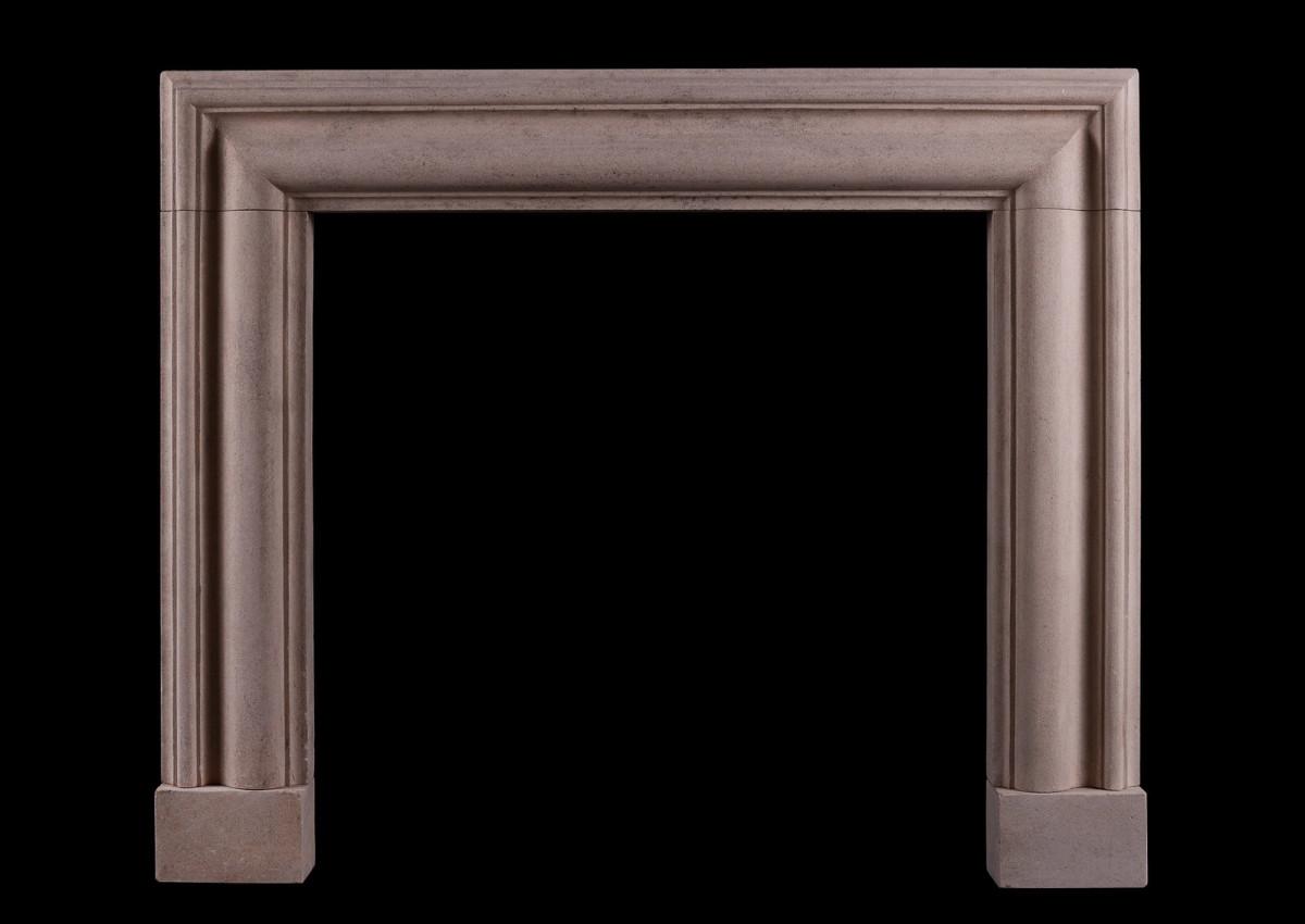 An English bolection Bath stone fireplace