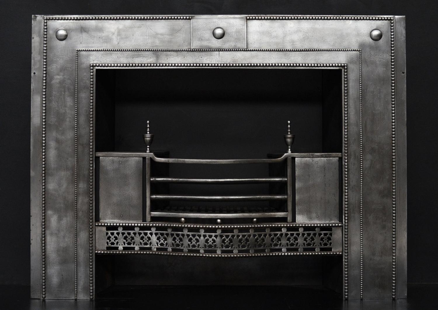 A period Georgian register grate in the manner of Robert Adam