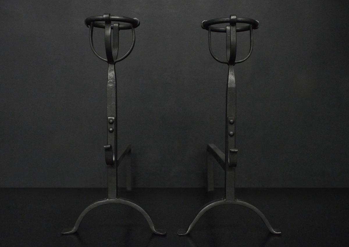 A pair of mulling top firedogs