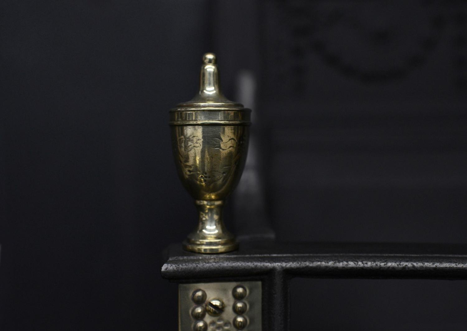 A brass and steel firegrate in the Georgian manner