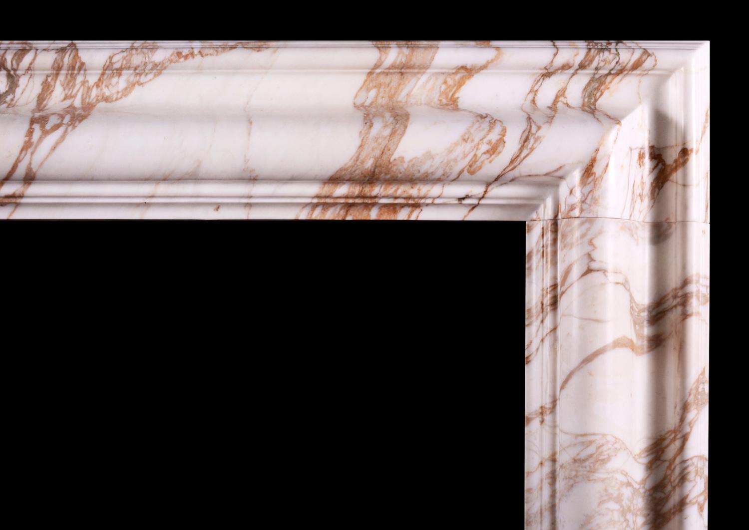 An English bolection fireplace in Calacatta Oro marble
