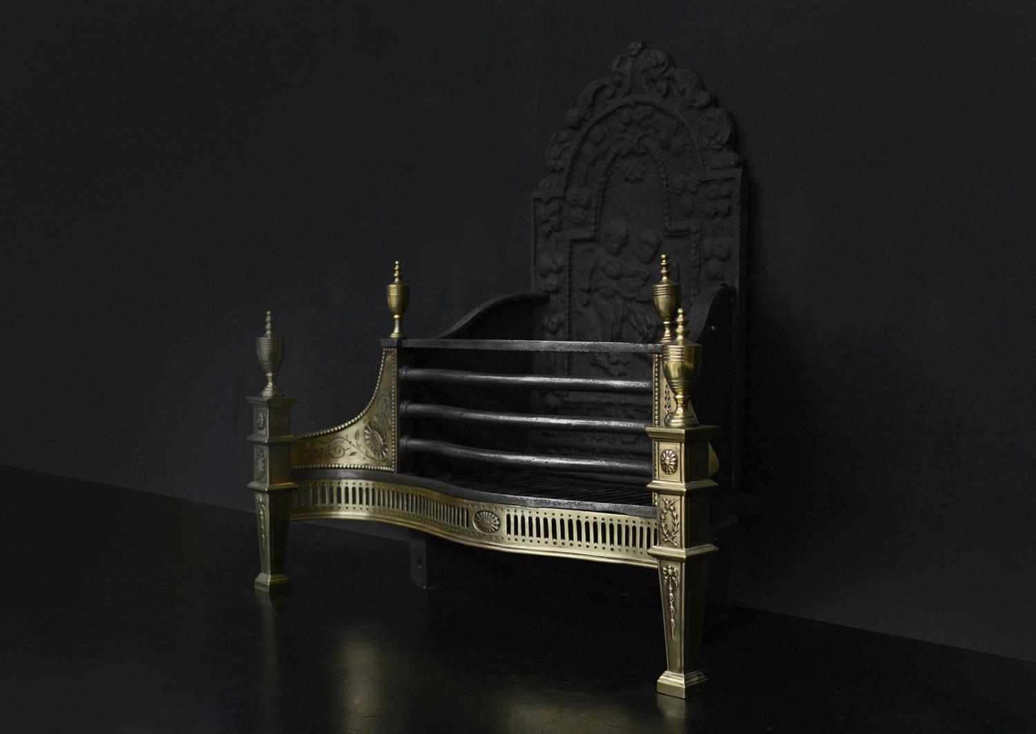 An English brass and steel firegrate in the Georgian style