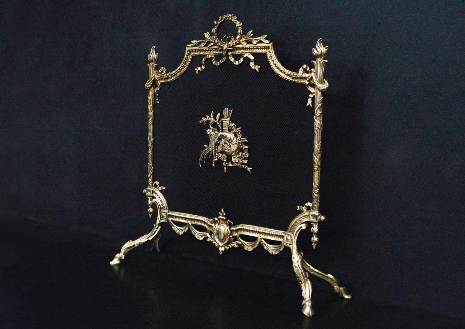 A 19th century English Regency style brass firescreen