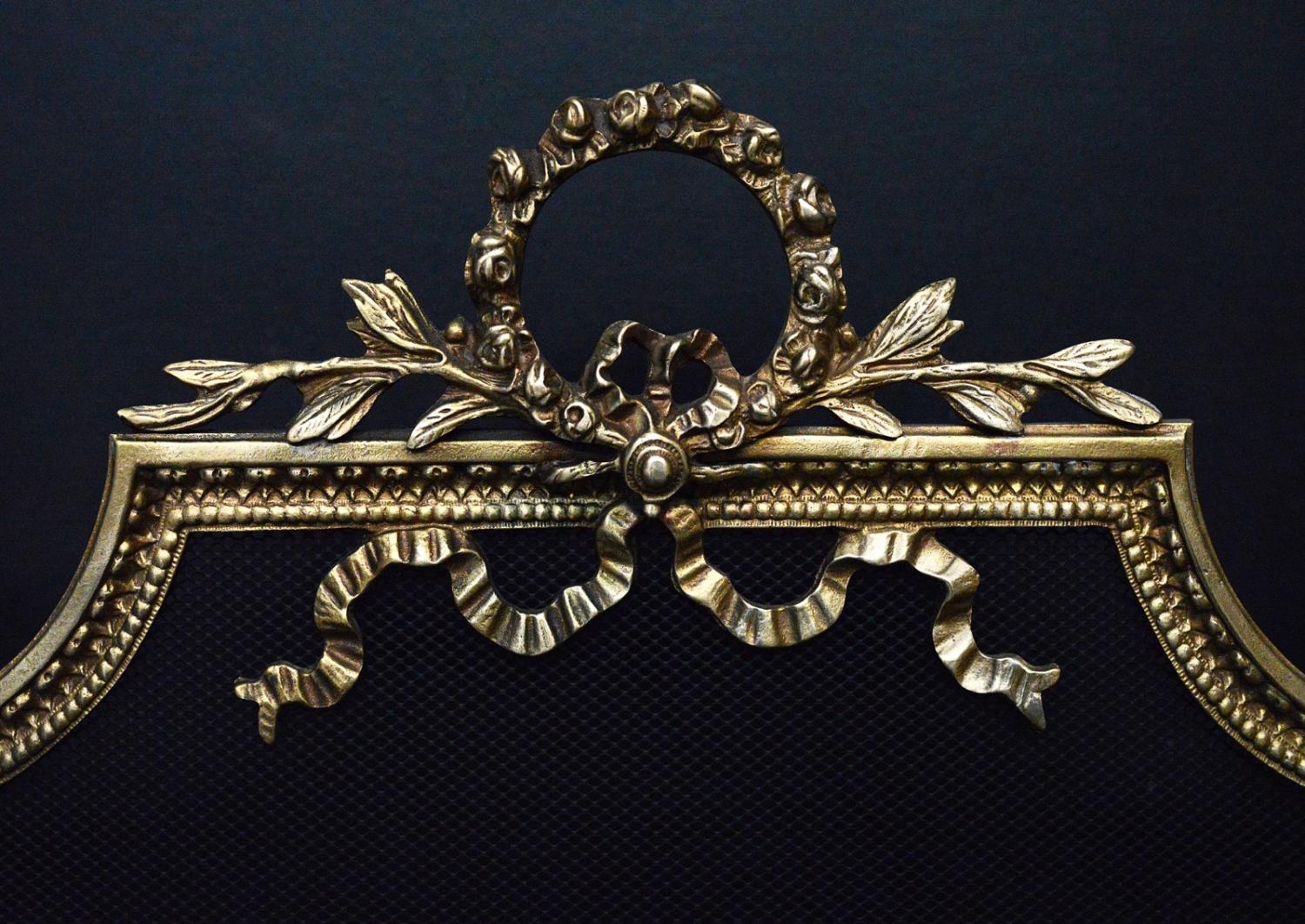 A 19th century English Regency style brass firescreen