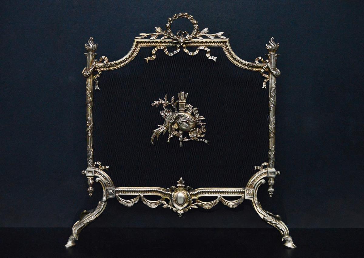A 19th century English Regency style brass firescreen