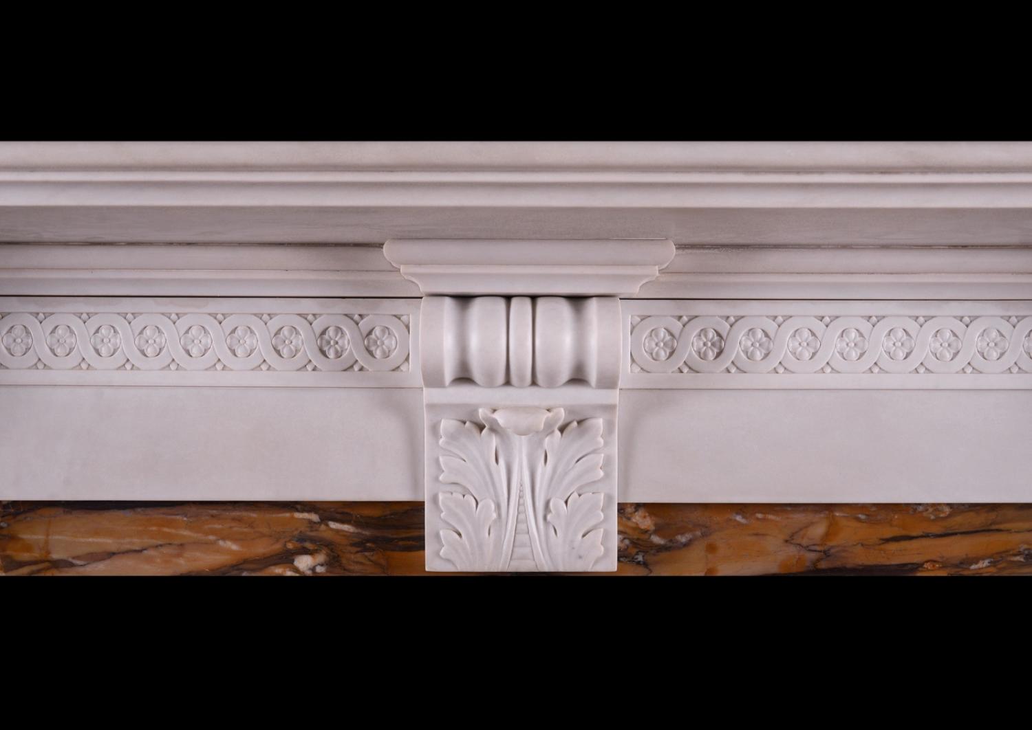 A Victorian fireplace in white marble
