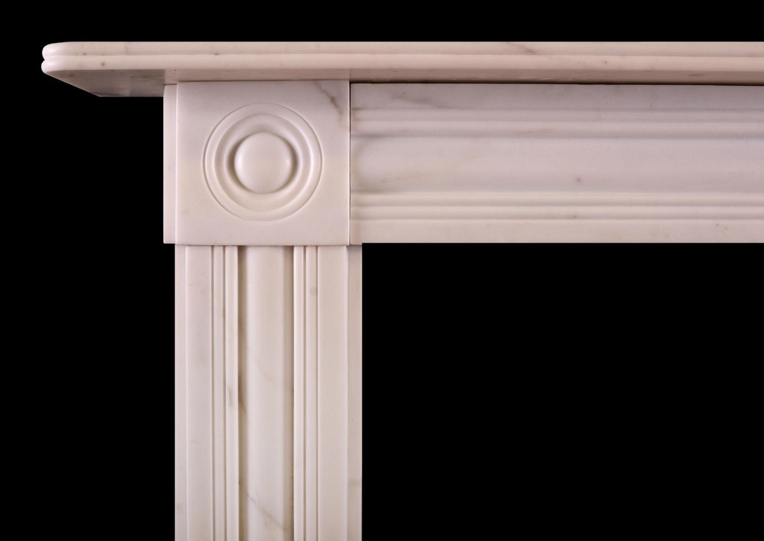 A Statuary marble fireplace in the Regency style