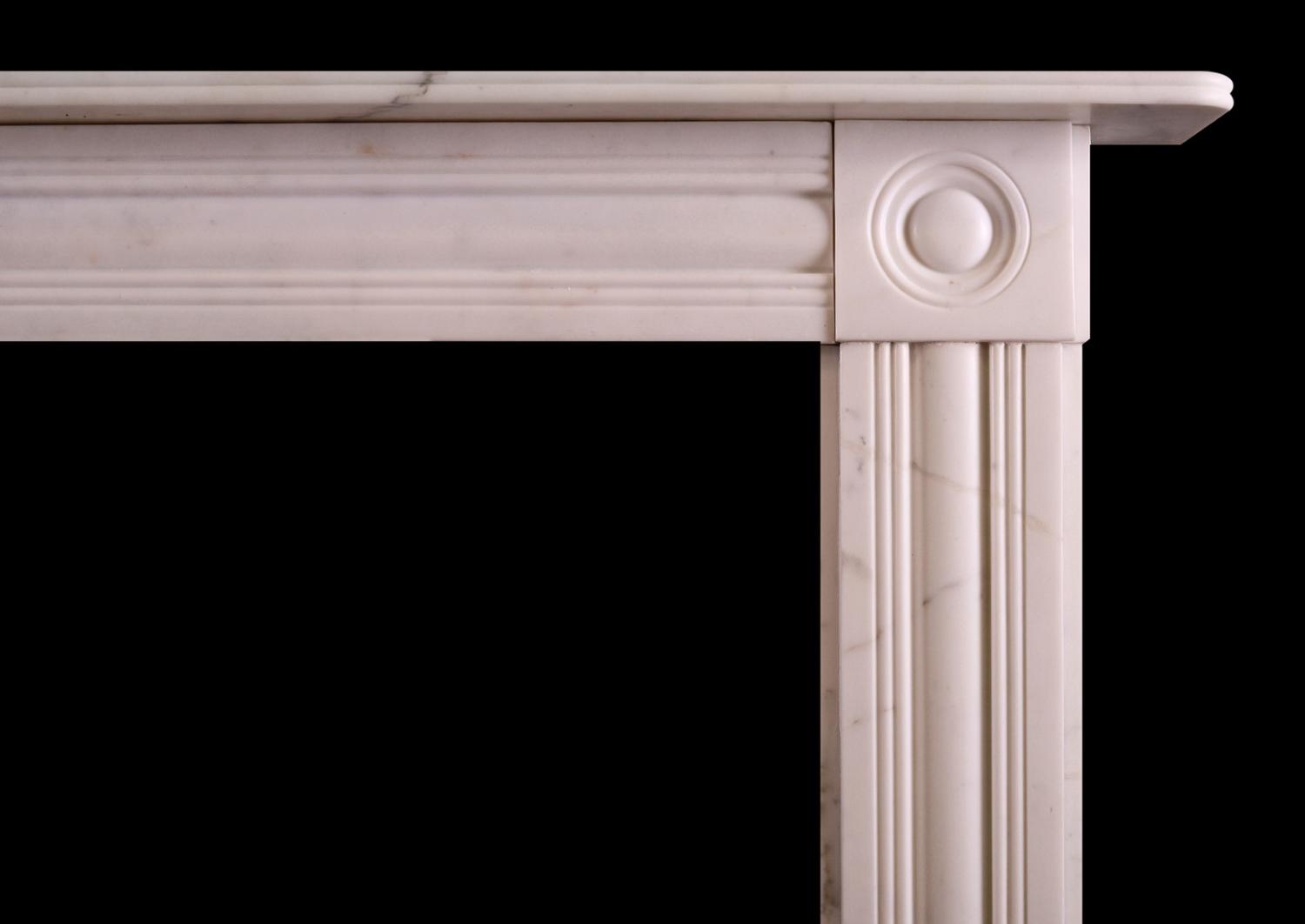 A Statuary marble fireplace in the Regency style