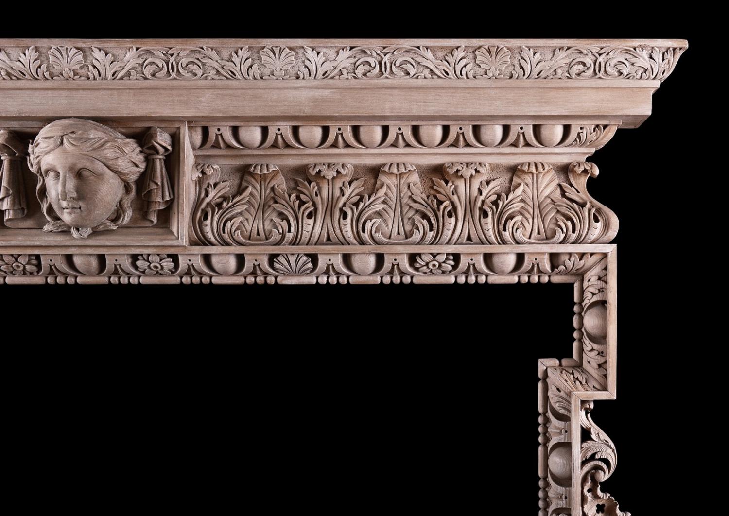 A carved pine fireplace in the George III style