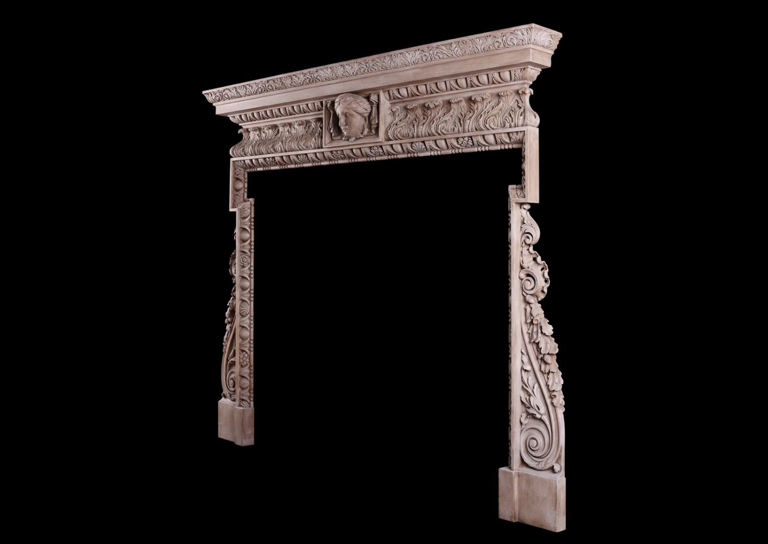 A carved pine fireplace in the George III style