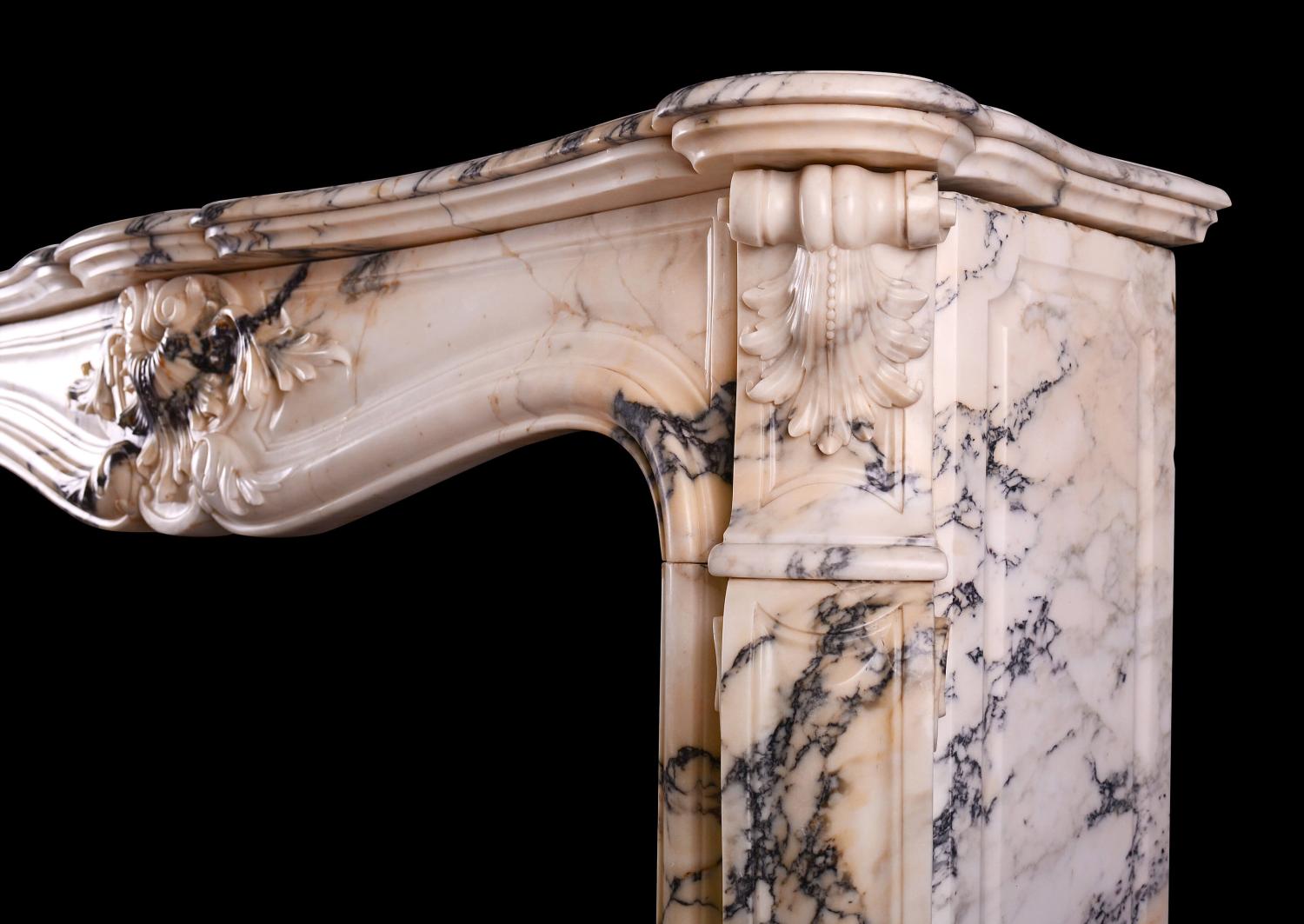 A fine quality Louis XV Paonazzo marble fireplace