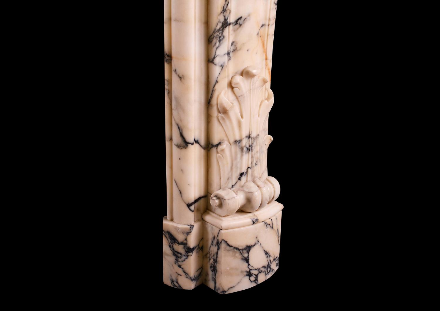 A fine quality Louis XV Paonazzo marble fireplace