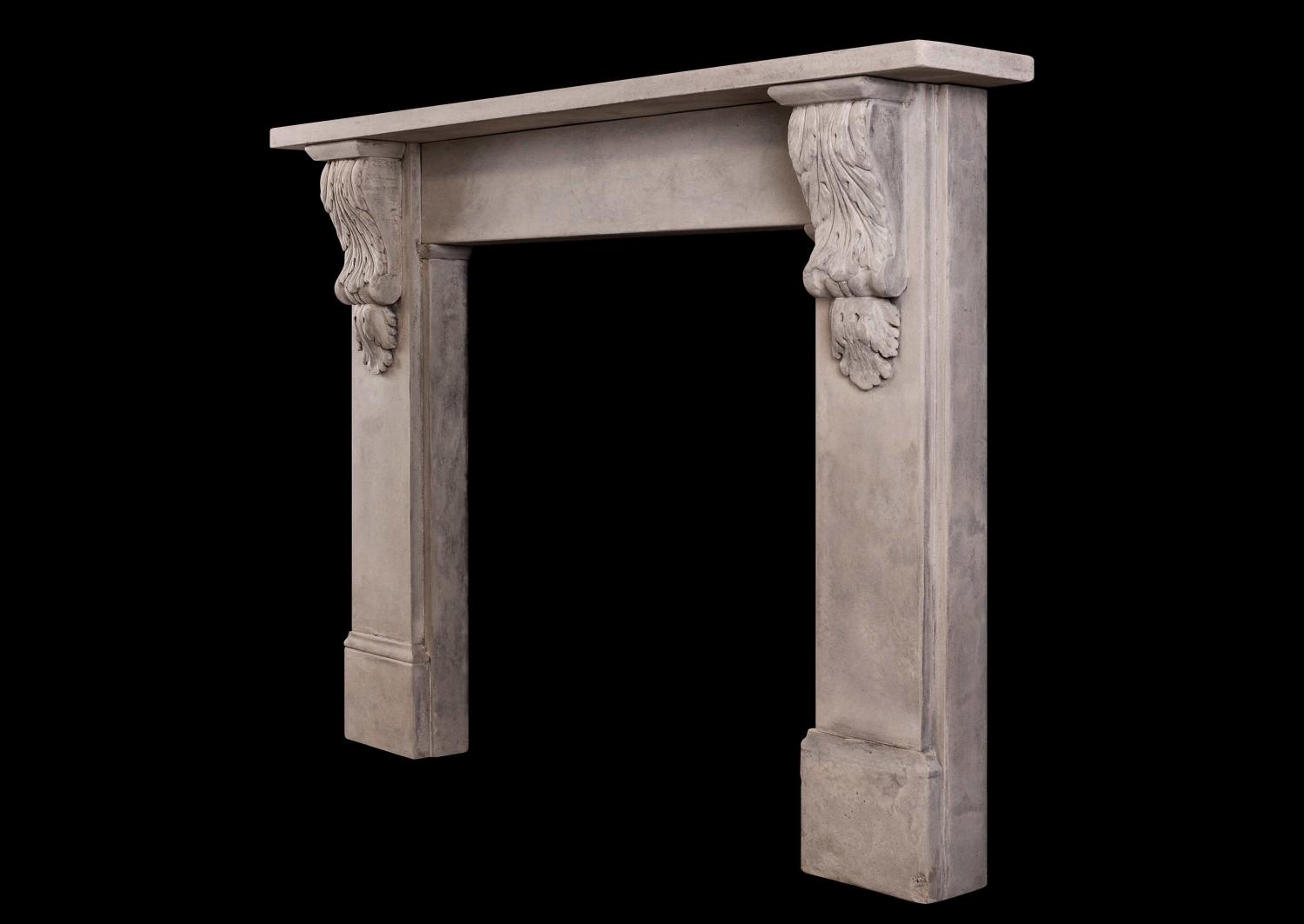 A reclaimed stone fireplace in the mid Victorian manner