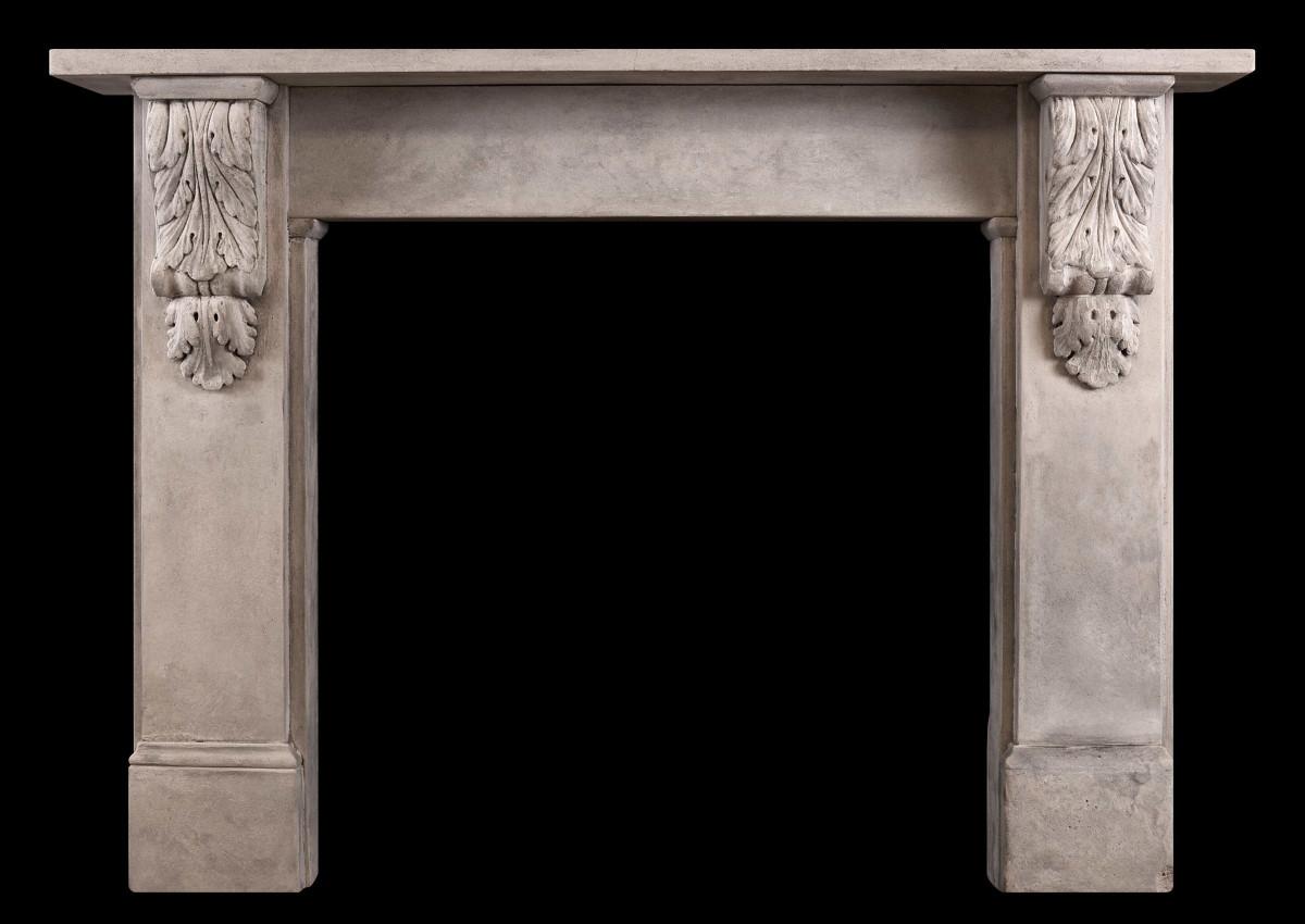 A reclaimed stone fireplace in the mid Victorian manner