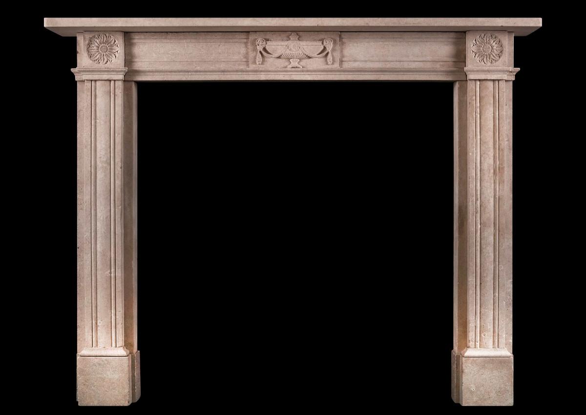 A fine quality English stone fireplace in the Regency manner