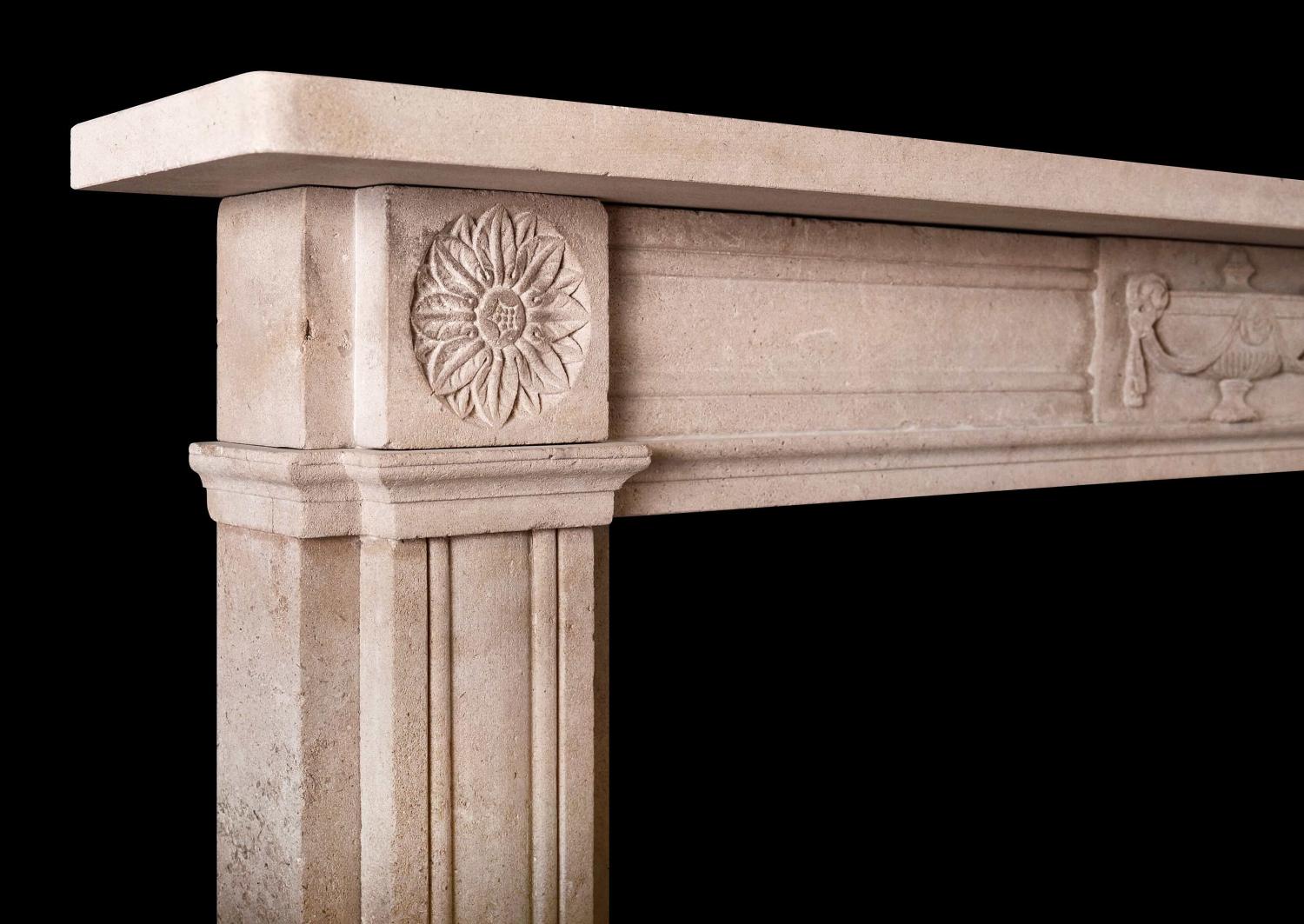 A fine quality English stone fireplace in the Regency manner