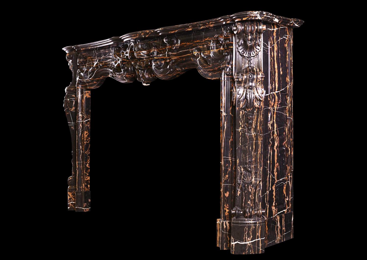 A striking Louis XV style marble fireplace