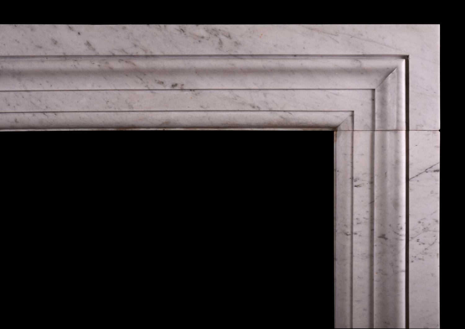 An architectural fireplace in Italian Carrara marble