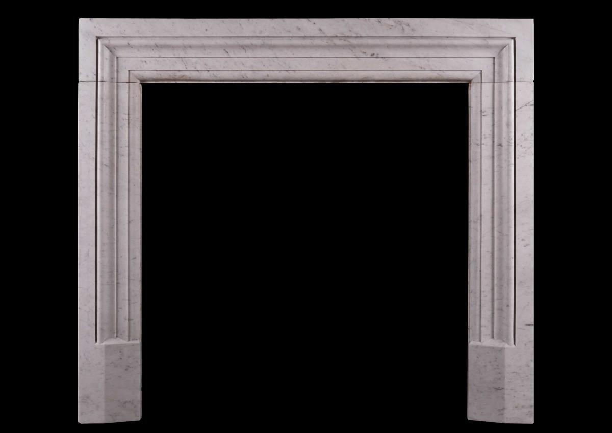 An architectural fireplace in Italian Carrara marble
