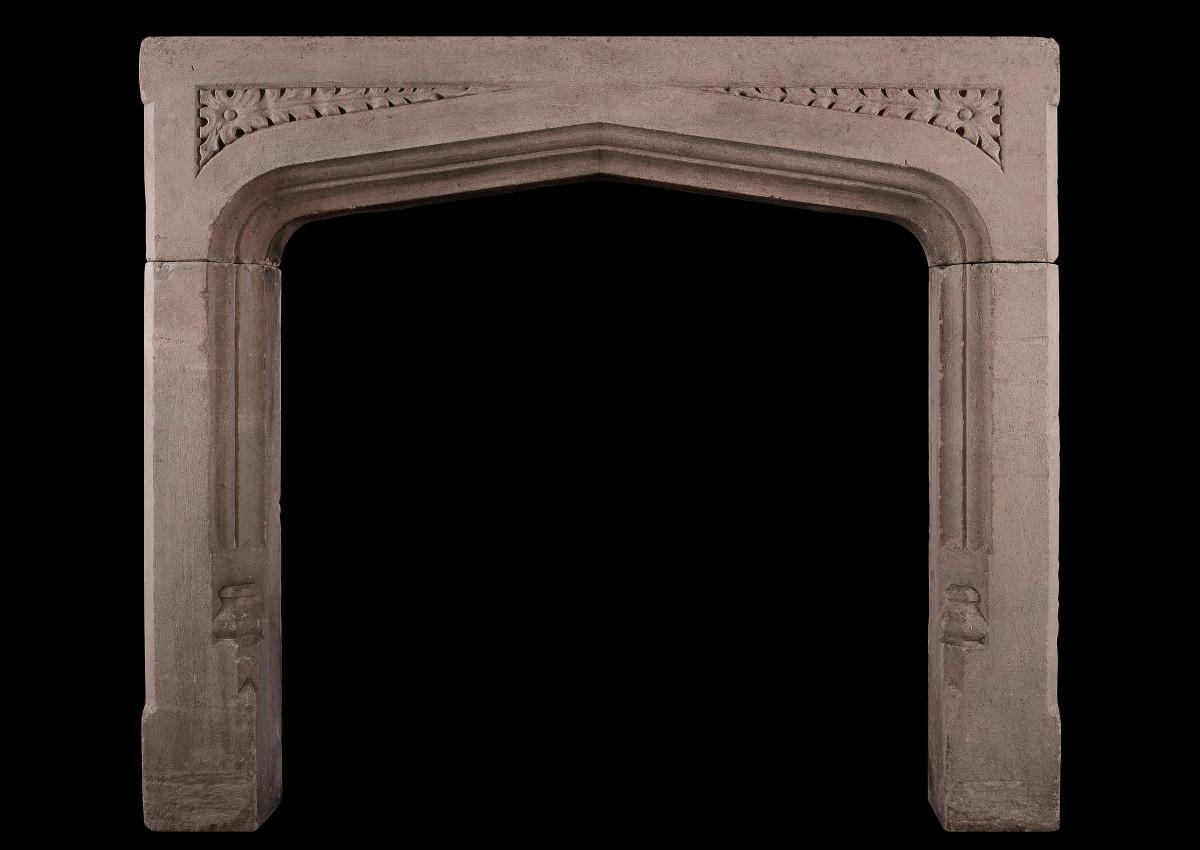 An English stone fireplace in the Gothic style