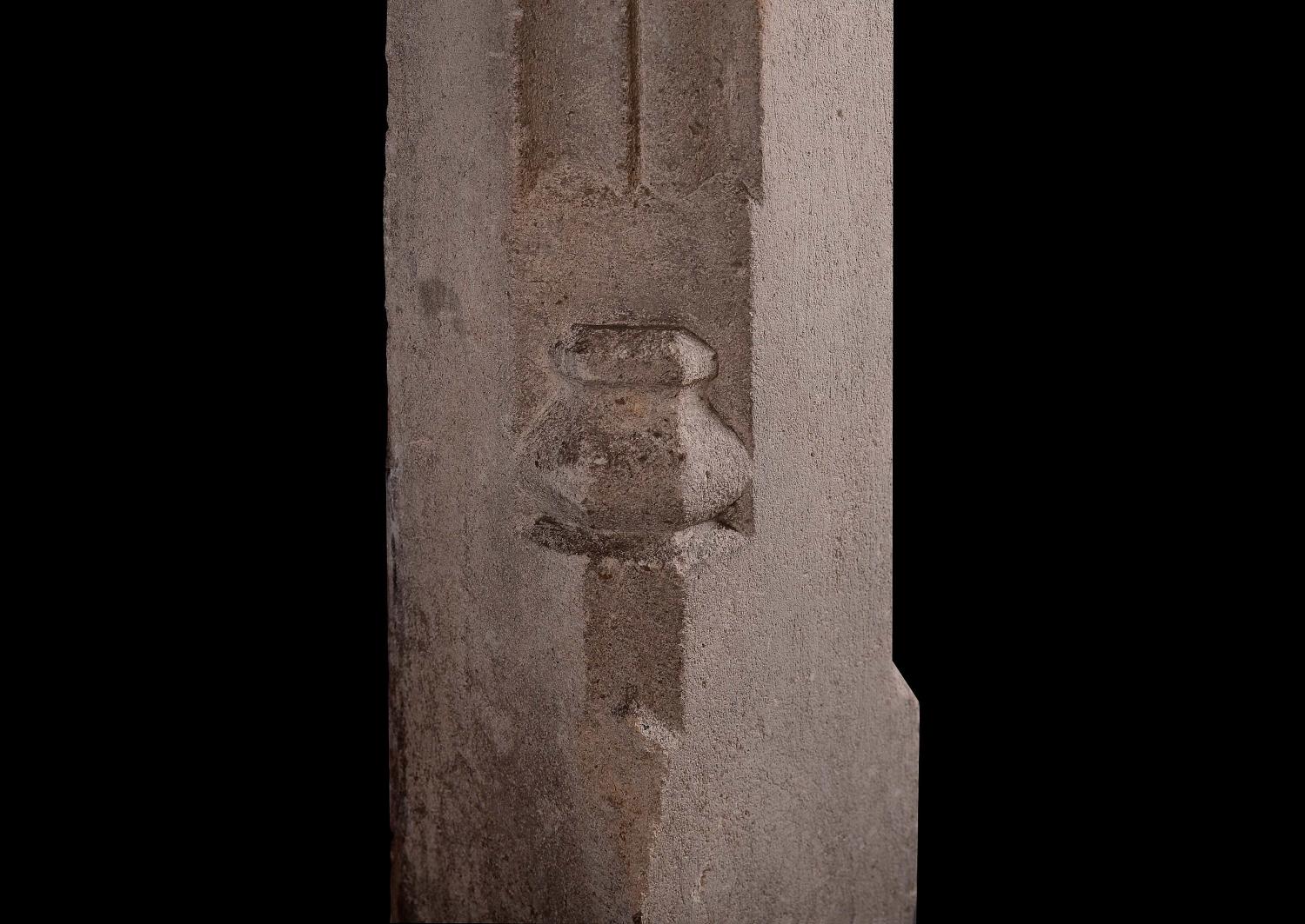 An English stone fireplace in the Gothic style