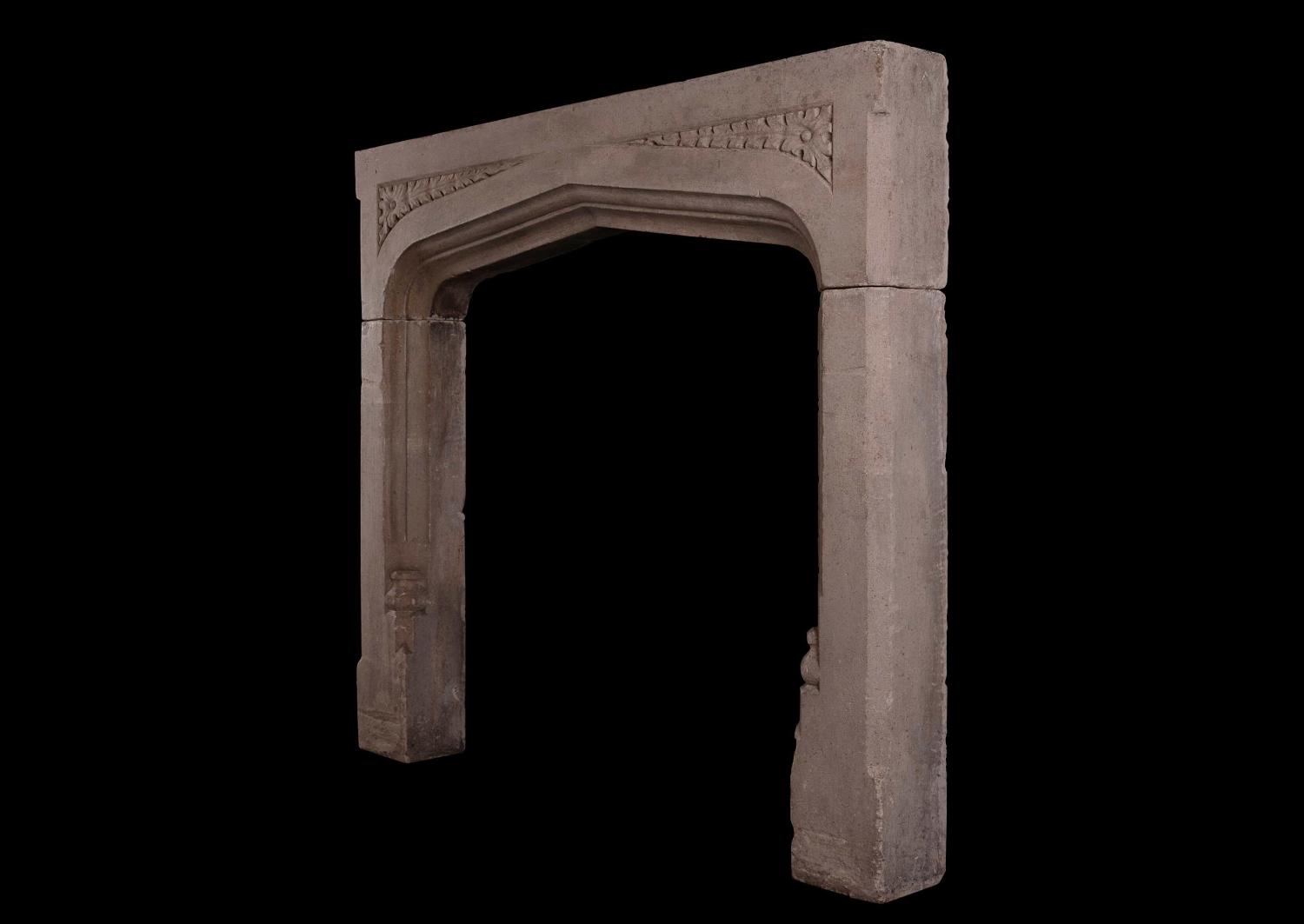 An English stone fireplace in the Gothic style