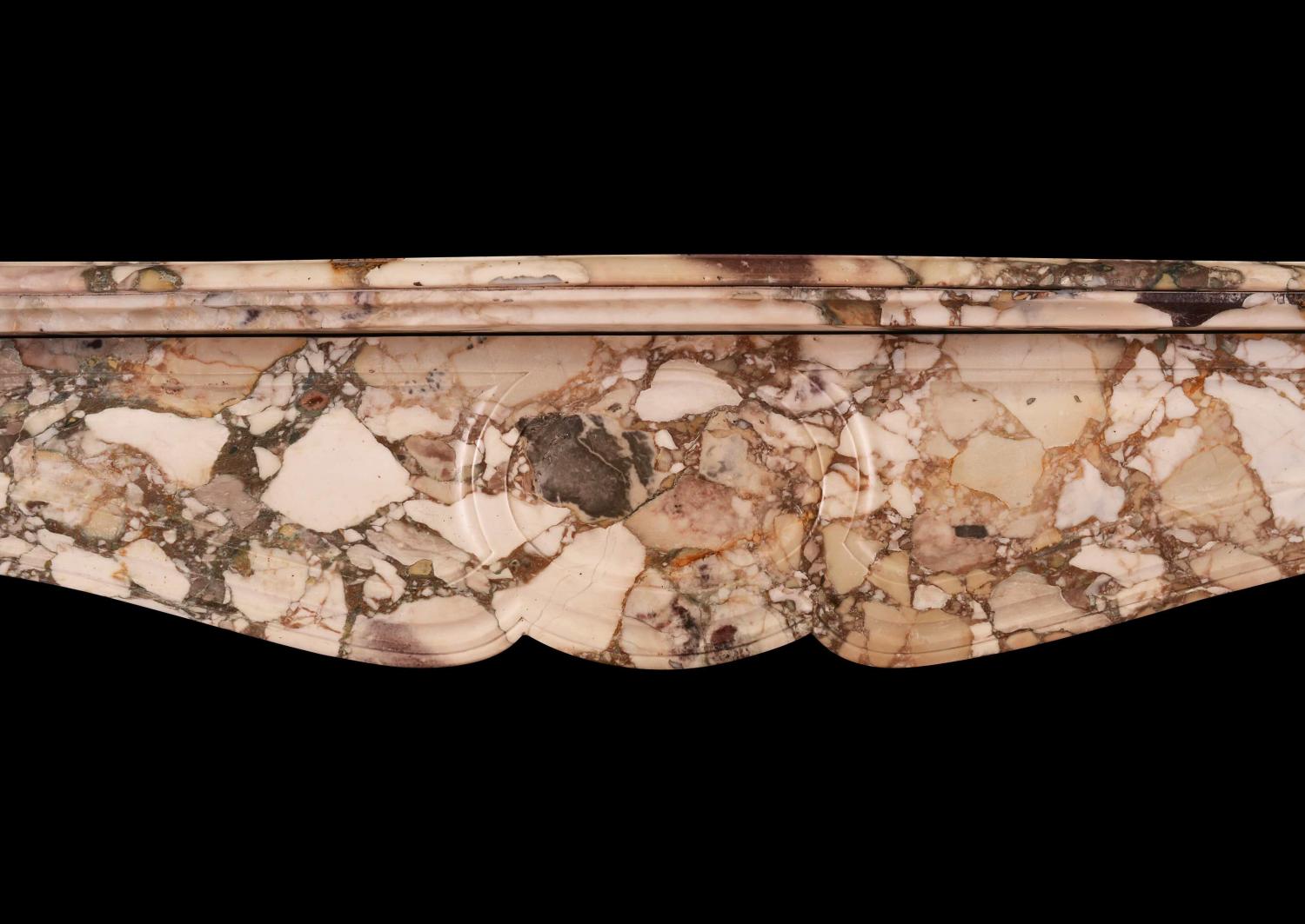A French Louis XV style fireplace in Brèche de Bénou marble