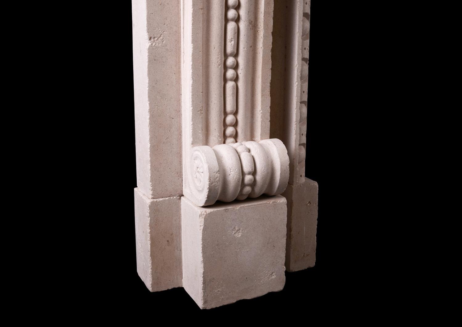 An English stone fireplace in the Georgian manner