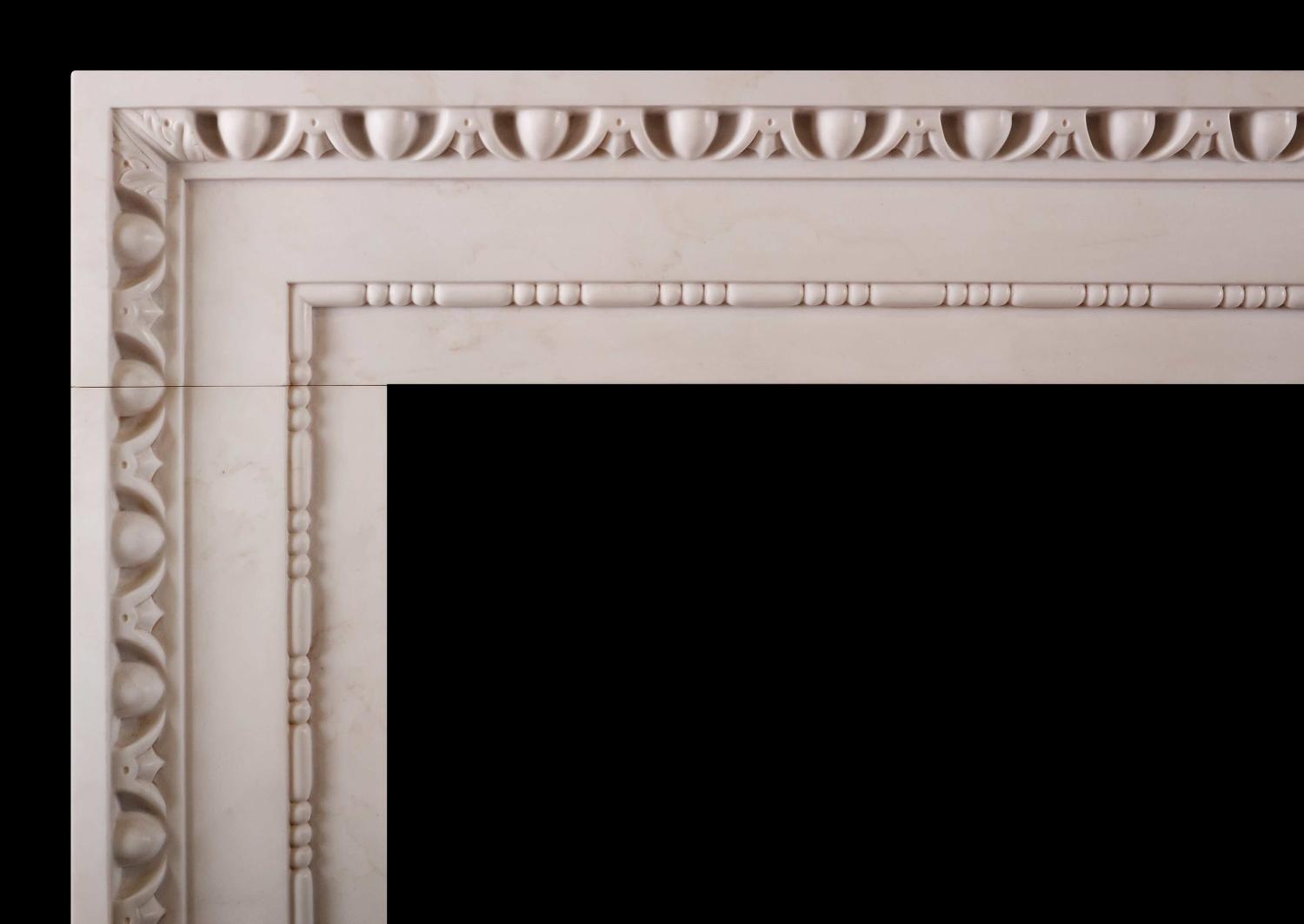 A white marble fireplace in the architectural style