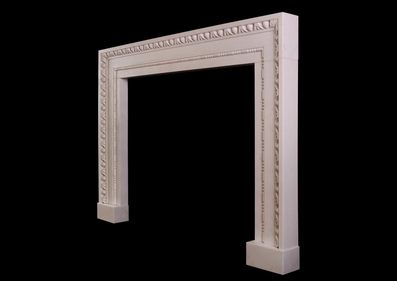 A white marble fireplace in the architectural style
