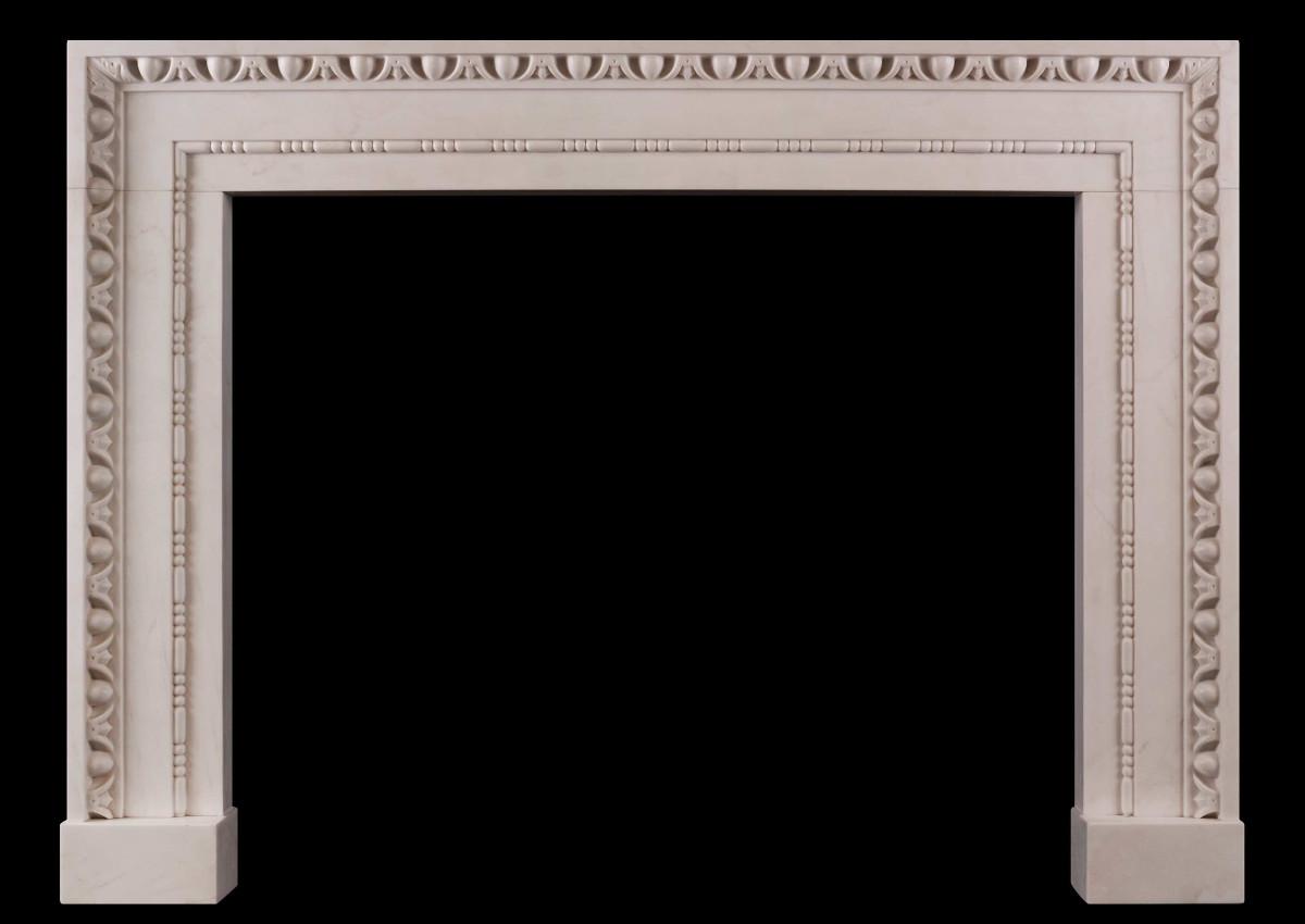 A white marble fireplace in the architectural style