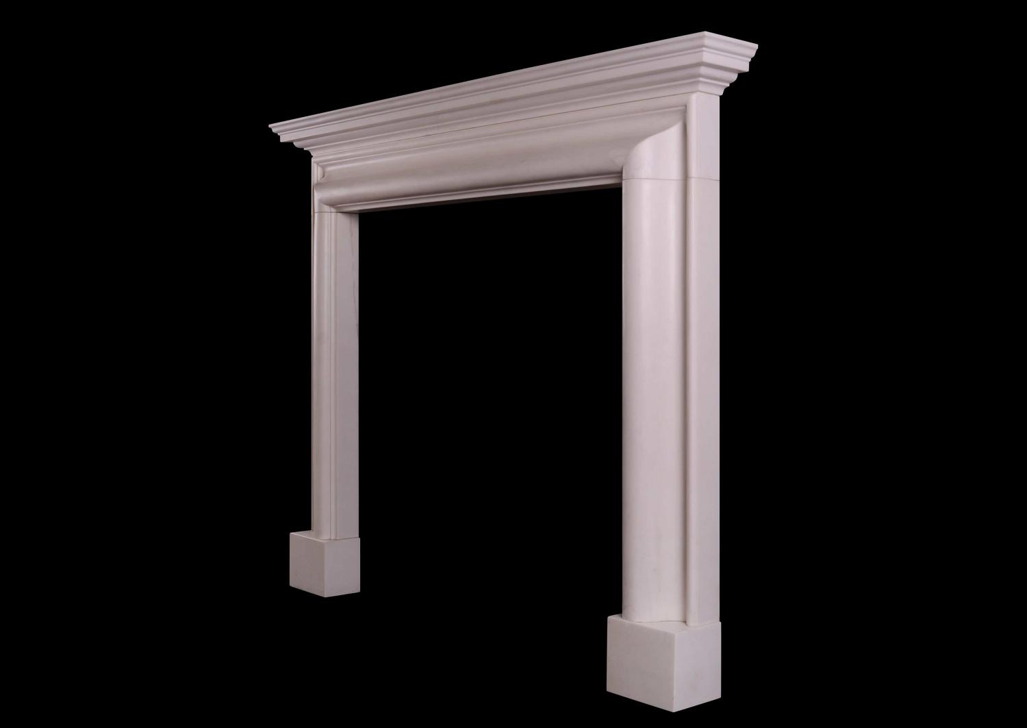 An architectural white marble fireplace